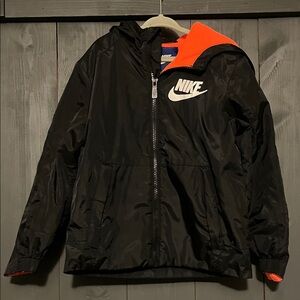 Nike Kids Black Windbreaker with Orange Accents